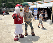 Nationals mascot Screech and AUSA mascot Sgt. Hero at Camp Legacy