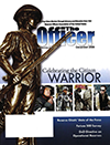 The cover of The Officer with the Minutman statue
